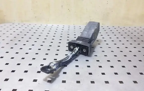 Front door check strap stopper
