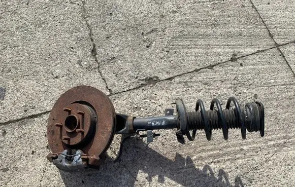Ford Focus Front shock absorber with coil spring BV6118045ABC