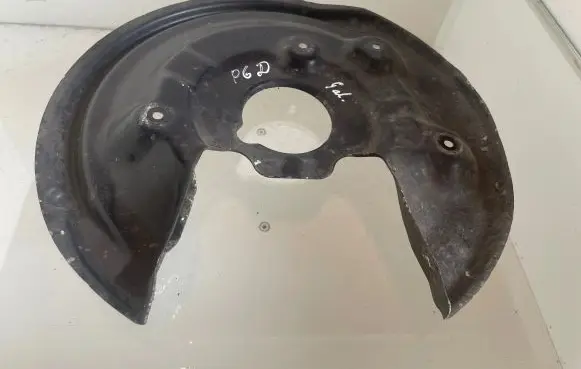 Volkswagen PASSAT B6 Rear brake disc plate dust cover 5N0615612C