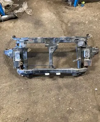 Radiator support slam panel