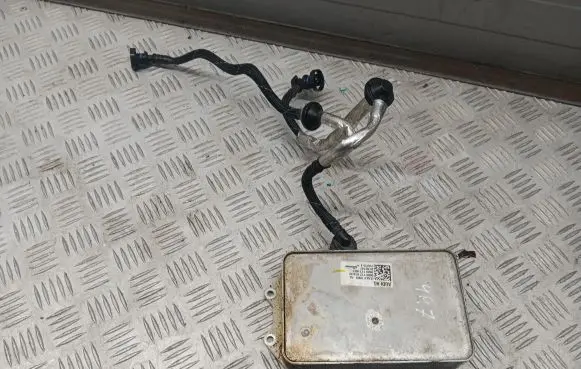 Audi Q7 4M Engine oil radiator 06M117015M