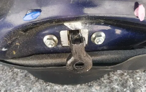 Front door check strap stopper