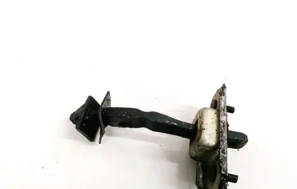 Mazda 323 F Front door check strap stopper 