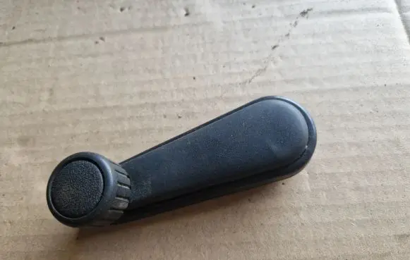 Volkswagen Golf II Front door window winding handle 191837579