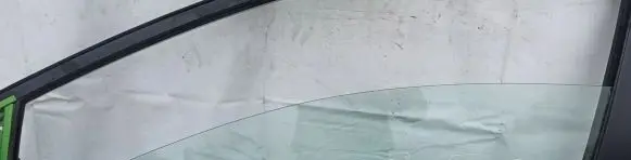 Mazda 2 Front door window glass four-door