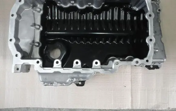 Volkswagen Golf VII Oil sump 04L103603H 04L103602A