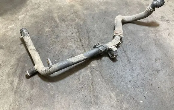 Volkswagen PASSAT B7 Engine coolant pipe/hose 03L121065AJ