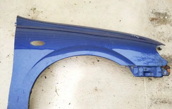 Nissan Almera N16 Fender melynas