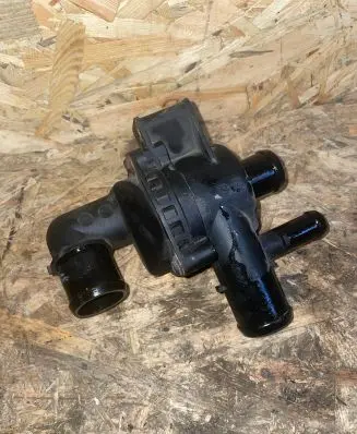 Thermostat/thermostat housing