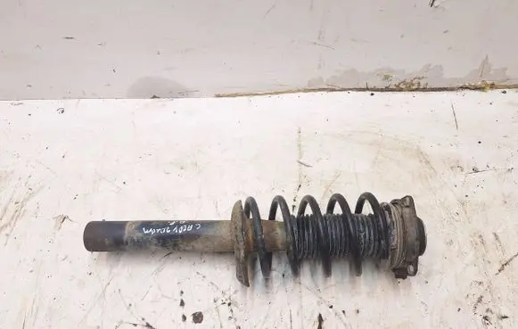 Volkswagen Caddy Front shock absorber with coil spring