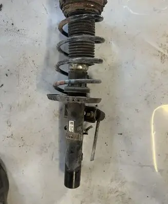 Skoda Fabia Mk2 (5J) Front shock absorber with coil spring Q0413031BJ