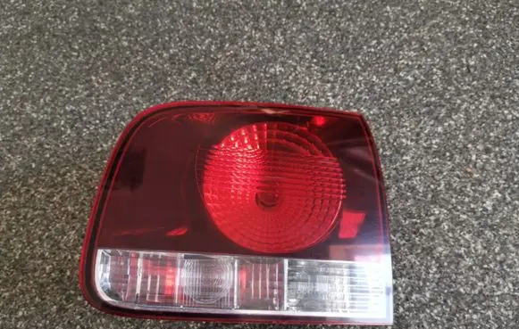 Volkswagen Touareg I Tailgate rear/tail lights 7L6945094