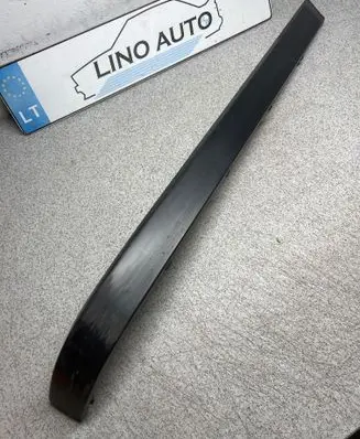 Rear bumper trim bar molding