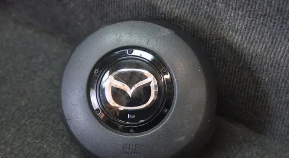 Mazda CX-7 Steering wheel airbag E22357K00 T93321A