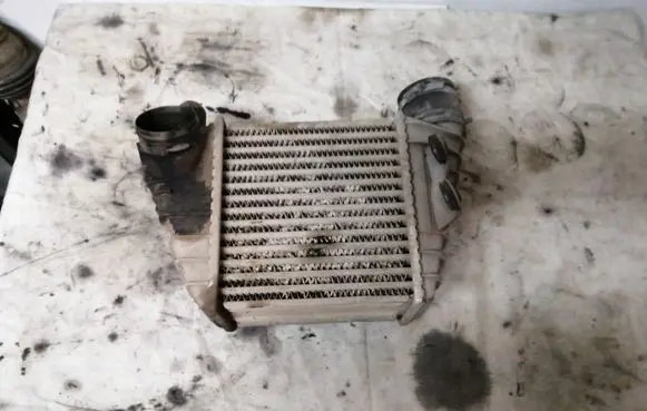 Volkswagen Golf IV Intercooler radiator 1J0145805D