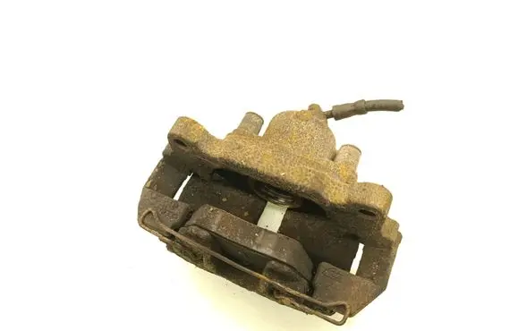 Volkswagen Touran I Front brake caliper 