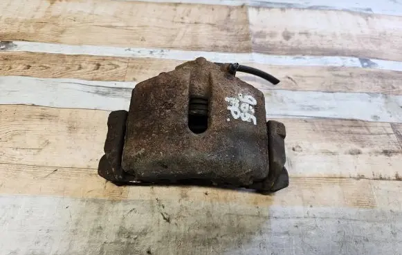 Volkswagen Golf V Front brake caliper