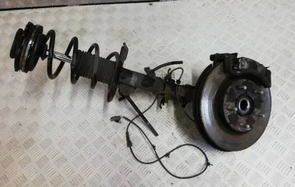 Front wheel hub spindle knuckle