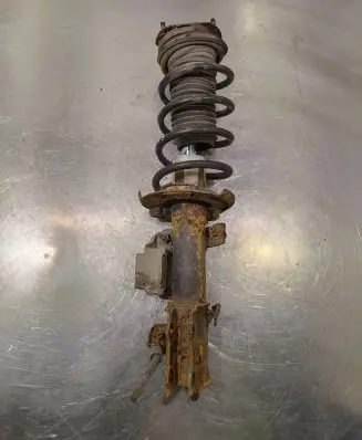 Front shock absorber with coil spring