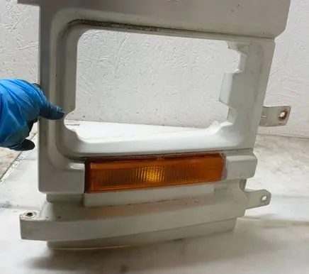 Renault Trafic I Under headlight/headlamp trim 5000421748