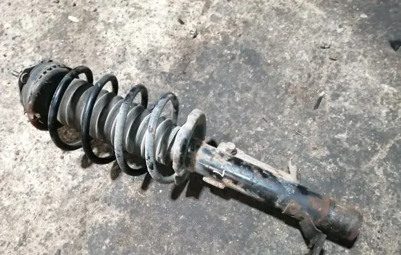 Mazda 2 Front shock absorber with coil spring 3M7118K001BA