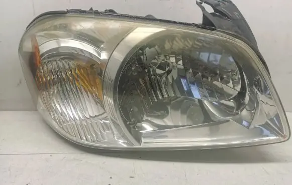 Mazda Tribute Headlight/headlamp 2T2413005A 3157NAK FD2945