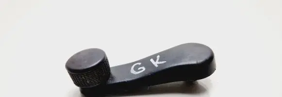 Volkswagen Golf III Rear door window winding handle 1H0837581