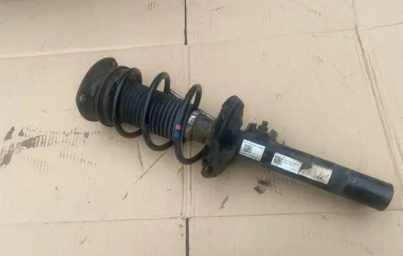 Volkswagen Golf VII Front shock absorber with coil spring 5Q0412014MD 2669VW0DHC12DDU
