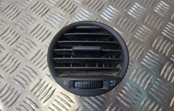 Volkswagen Caddy Dash center air vent grill 2K0819703B