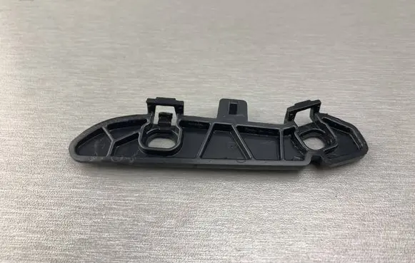 Front bumper mounting bracket