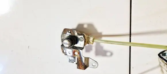 Honda FR-V Front door lock (next to the handle) 