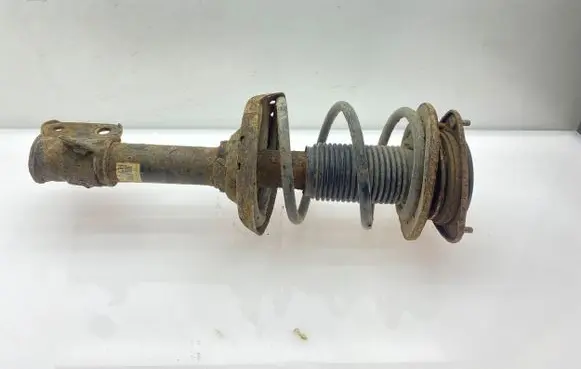 Subaru Outback Front shock absorber with coil spring
