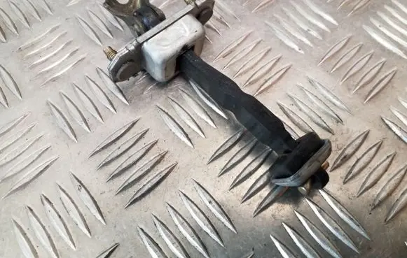 Subaru Legacy Front door check strap stopper