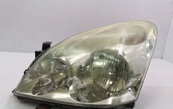 Toyota Corolla Verso AR10 Headlight/headlamp 7357230400 E110683