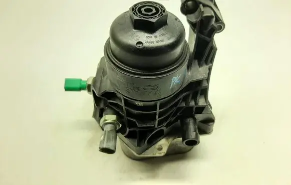 Volkswagen Golf VII Oil filter mounting bracket 03N115389