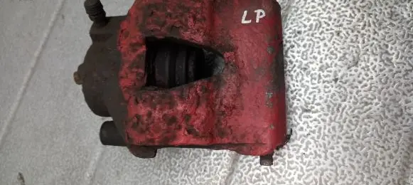 Volkswagen Golf IV Front brake caliper