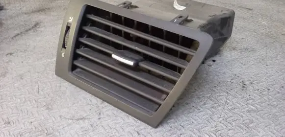 Volkswagen Routan Dashboard side air vent grill/cover trim