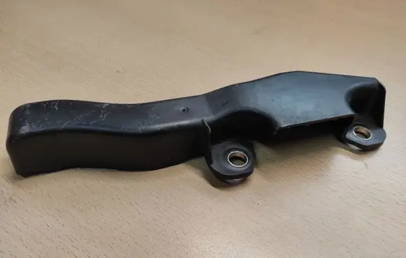 Engine bonnet/hood lock trim molding