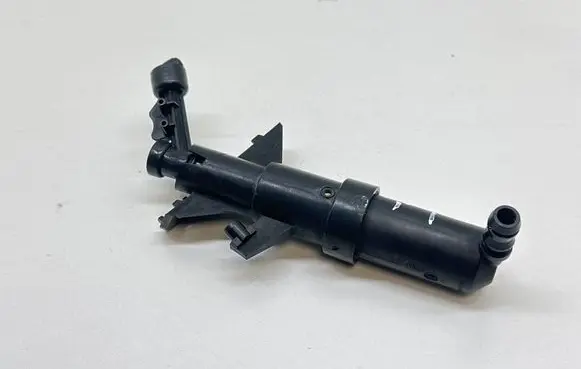 Headlight washer spray nozzle