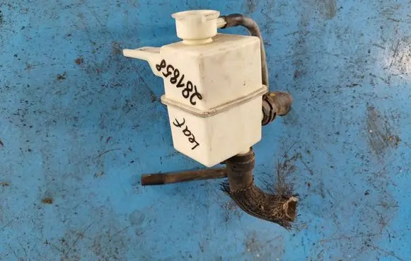 Nissan Leaf I (ZE0) Coolant expansion tank/reservoir 215373NA0A