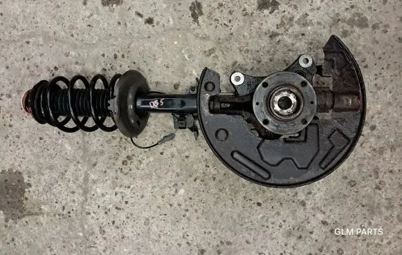 Front shock absorber with coil spring