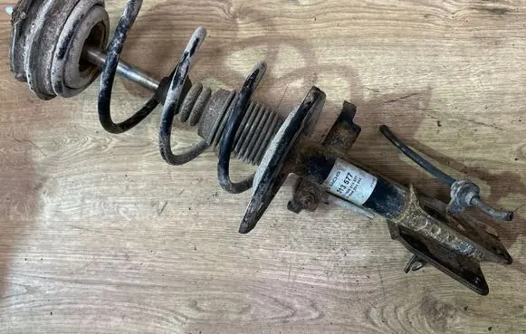 Renault Laguna II Front shock absorber with coil spring