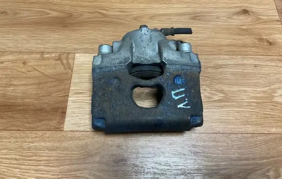 Saab 9-3 Ver2 Front brake caliper 