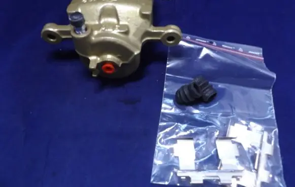 Nissan Almera Front brake caliper 54302 410110M600 UBD