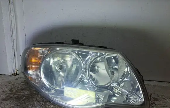 Chrysler Voyager Headlight/headlamp 04857830AC 6240200000