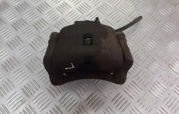 Nissan Almera N16 Front brake caliper