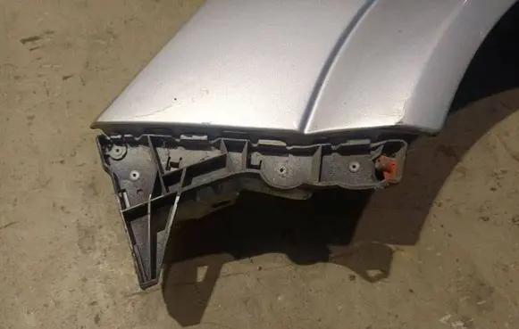 Opel Astra H Front bumper mounting bracket 