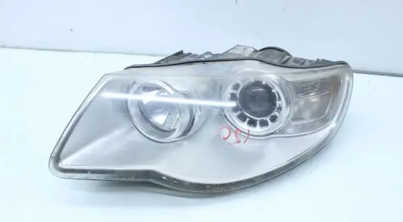 Volkswagen Touareg I Headlight/headlamp 7L6941039