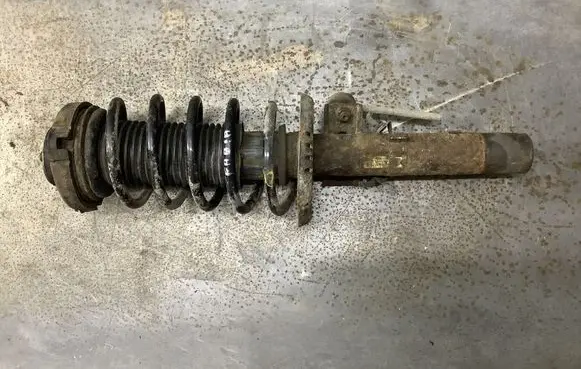 Front shock absorber with coil spring
