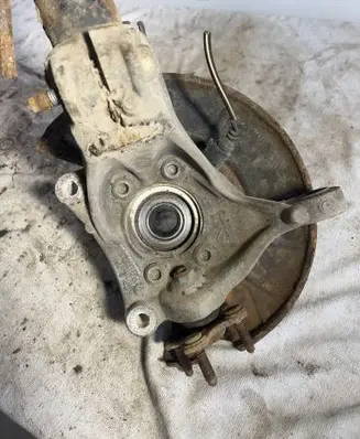 Volkswagen PASSAT B7 Front wheel hub spindle knuckle